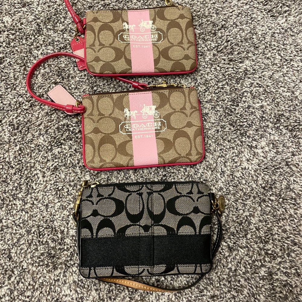 Three Coach Wristlets
